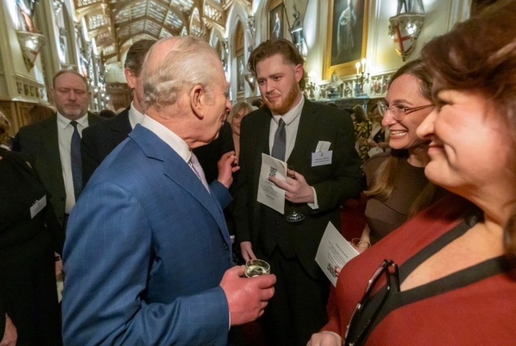 A photograph of Dylan at the Royal Reception meeting King Charles 